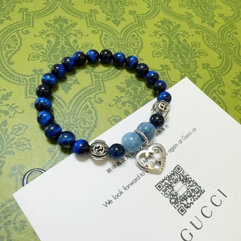 G*u*i bracelets